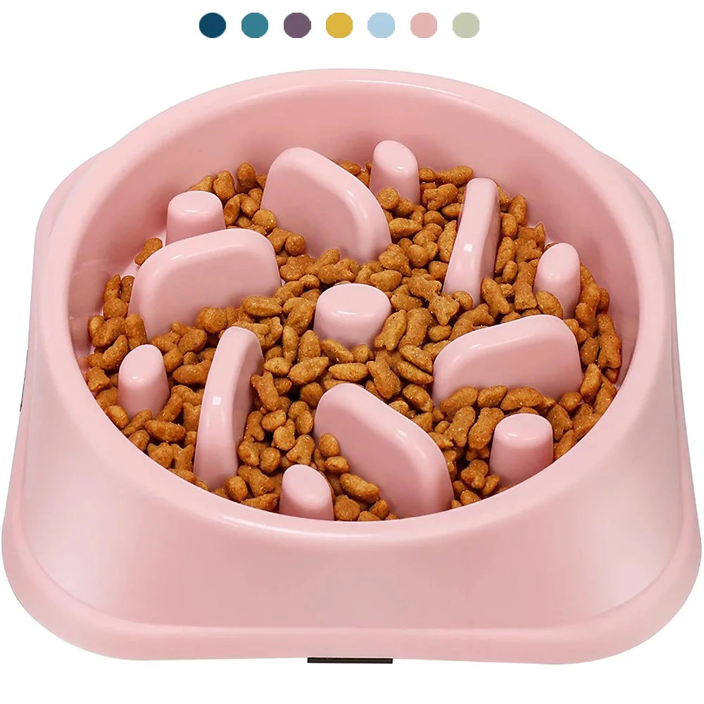 Maze-pattern anti-gulp slow feeder pet bowl on a kitchen floor