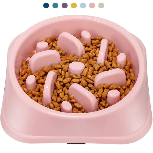 Maze-pattern anti-gulp slow feeder pet bowl on a kitchen floor