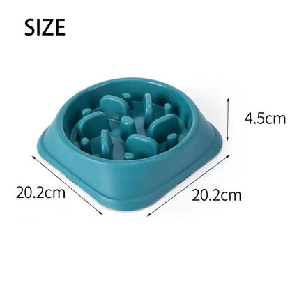 Maze-pattern anti-gulp slow feeder pet bowl on a kitchen floor